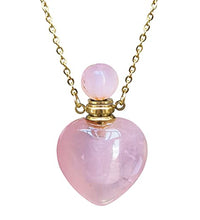 collar con botella de perfume rosa
