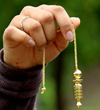 péndulo de sanación con oro