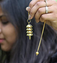 péndulo metálico para mejorar la meditación