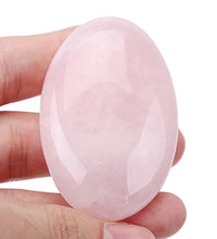 piedras ovaladas de cuarzo rosa pulido