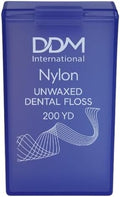 Hilo Dental Nylon DDM International Sin Cera - 200 Yardas con Dispensador, Protección para Dientes y Encías, Caja Transparente Morada - imagen 1