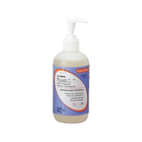 Recarga de Enjuague Bucal Concentrado 0.63% Fluoruro Estannoso, Sabor Frutas Tropicales, Botella de 10 oz con Dosificador - imagen 1