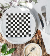 servilletas blancas y negras elegantes