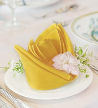 servilletas de tela amarillas para mesa