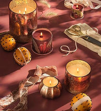 vela aromática Illume para ambiente acogedor