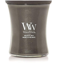 vela aromática WoodWick con mecha crepitante